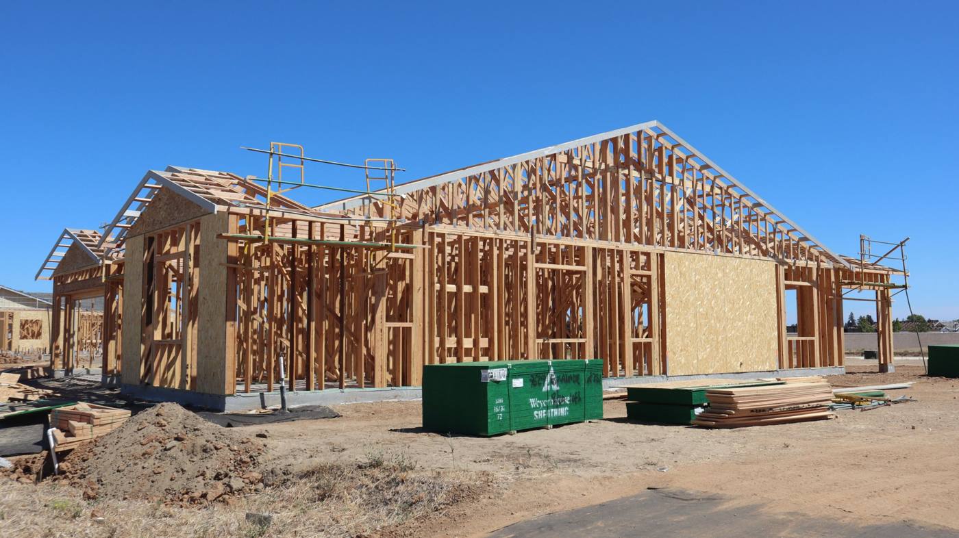 New home framing on a build-ready lot