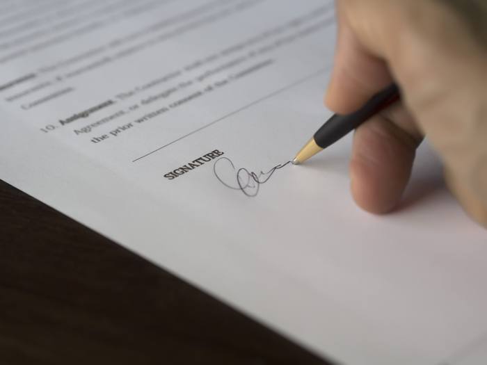 Signing a purchase agreement